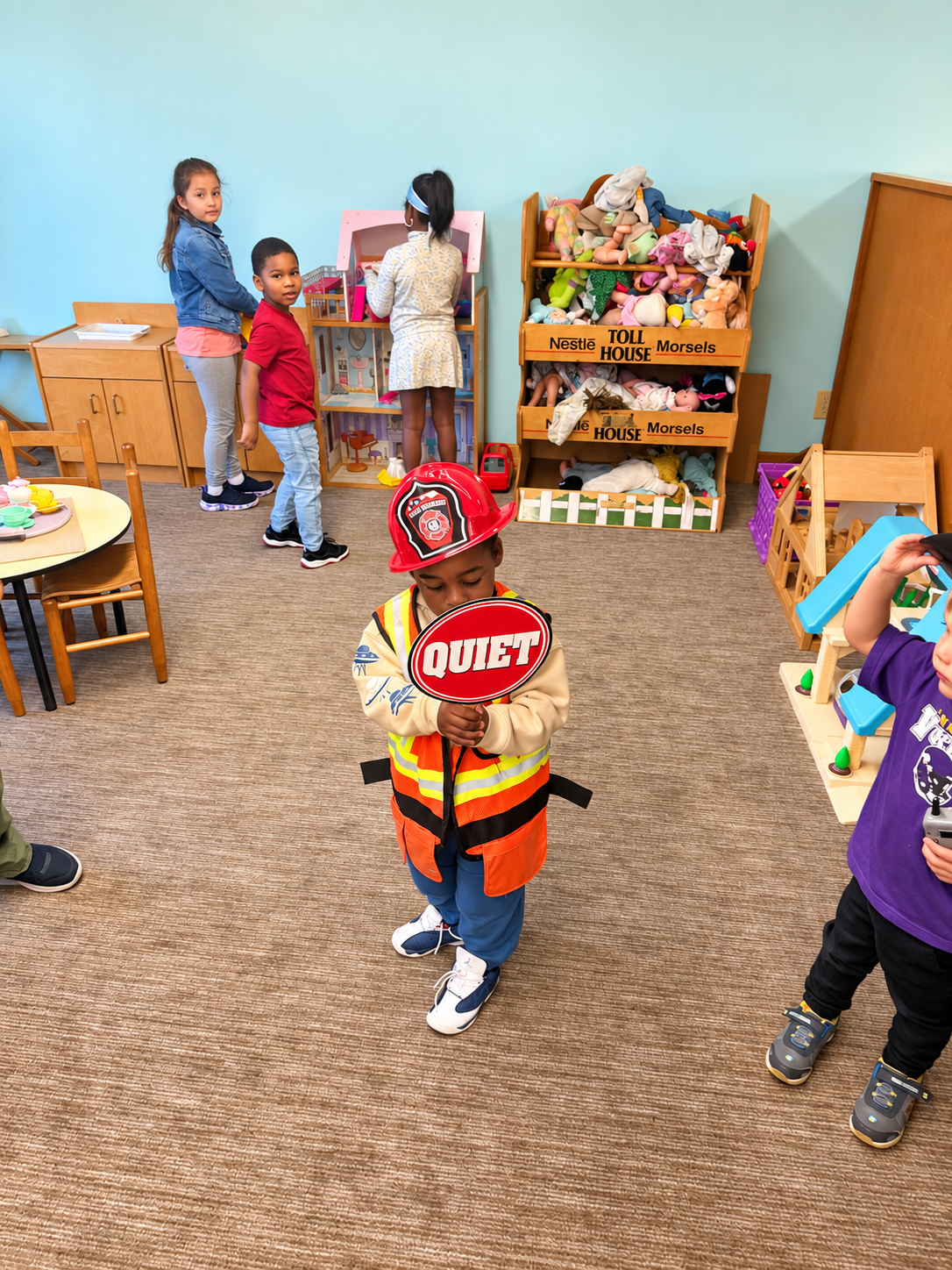 Children enjoying imaginative play in the classroom