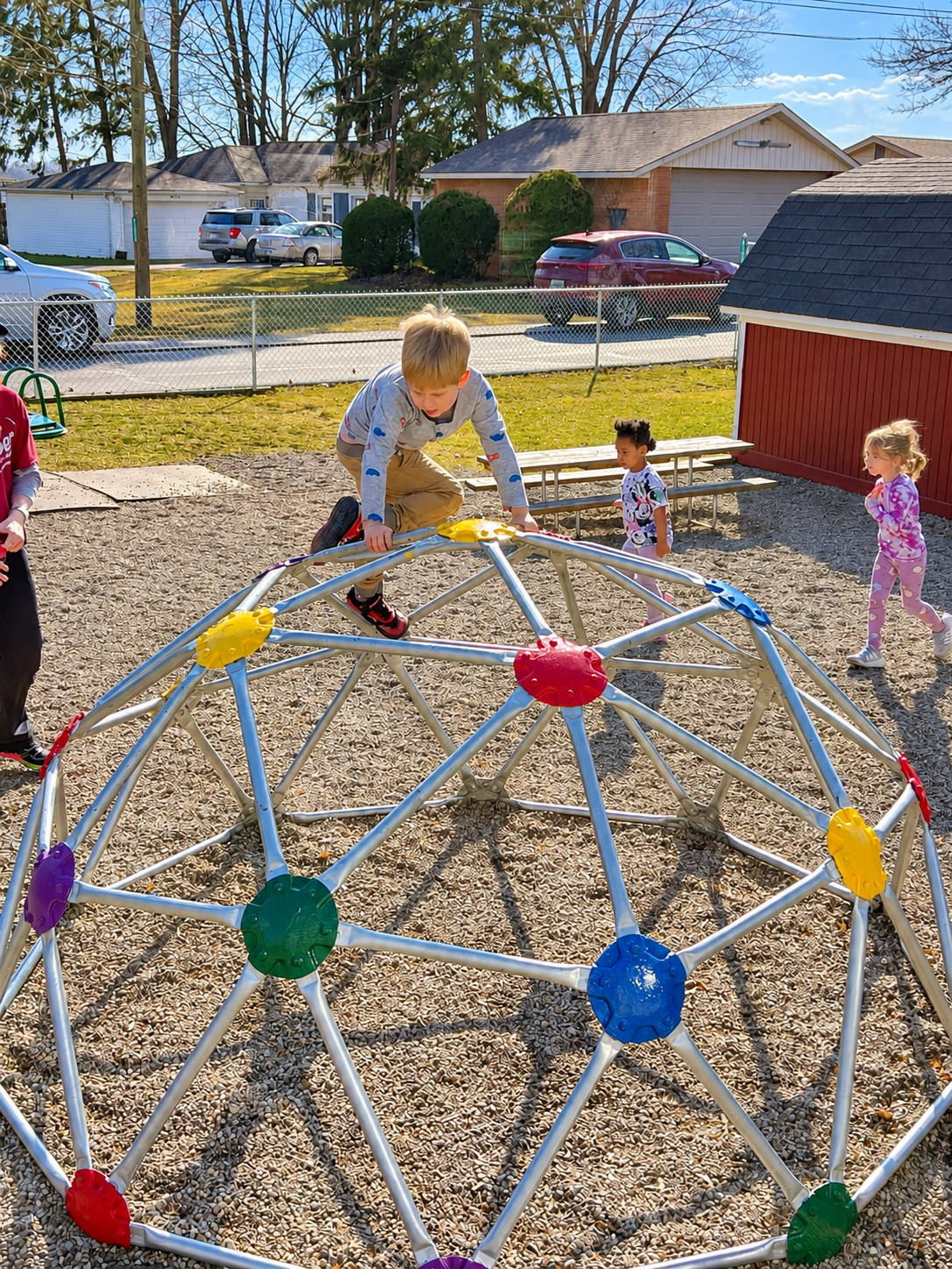 Children climbing on the outdoor playground